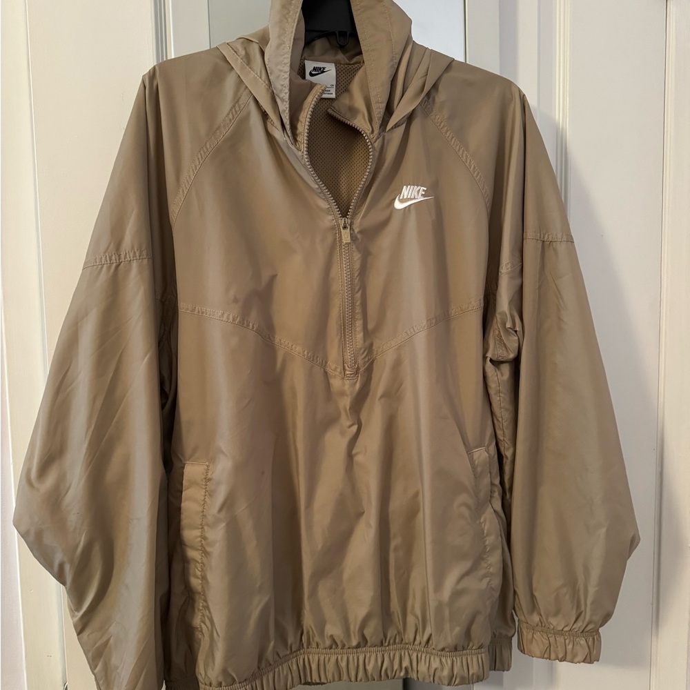 Nike 3/4 zip pullover windbreaker with hood. Brand new without tags